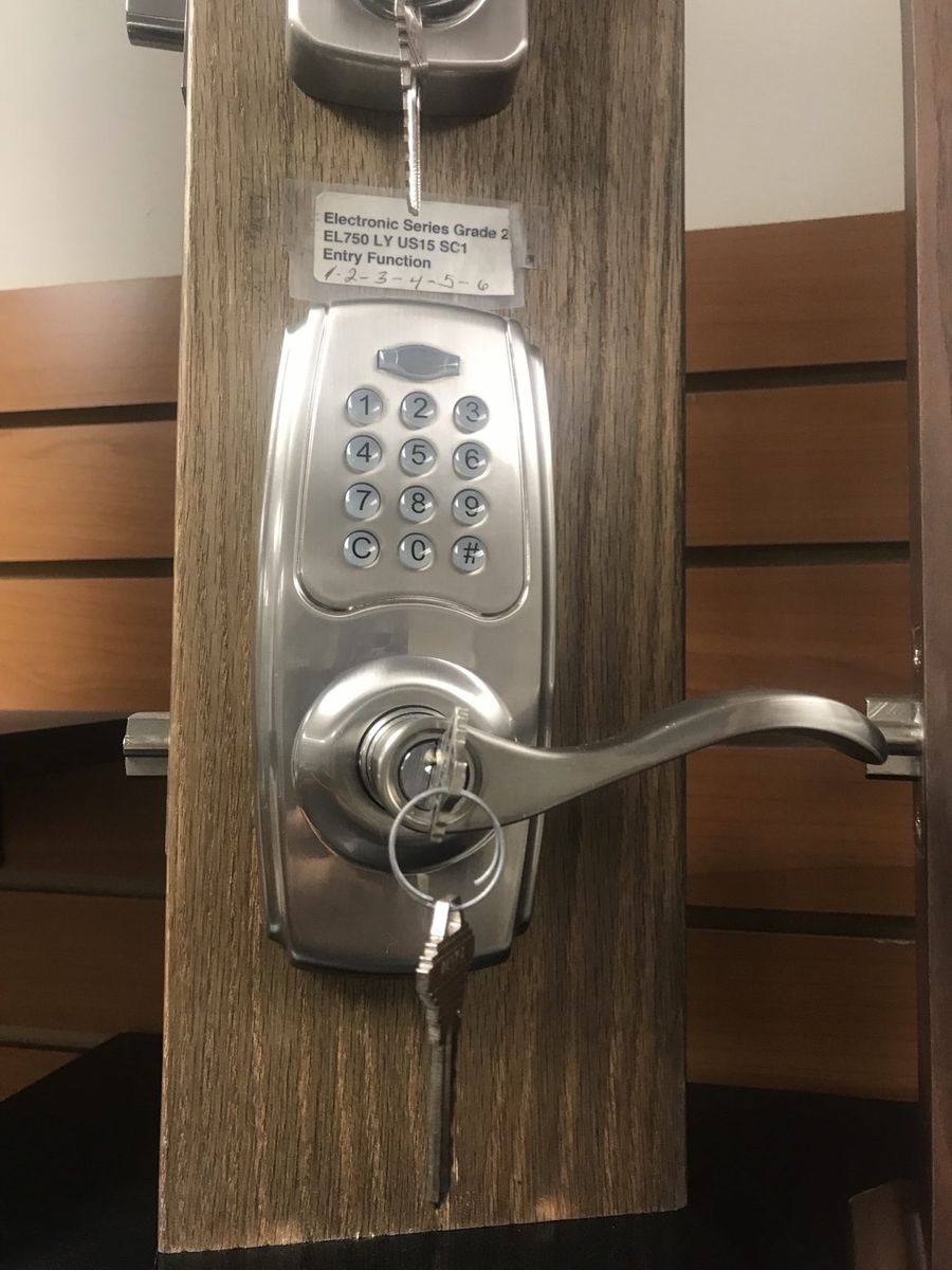 Commercial electronic keypad lever installed on a Tradition office suite by St Lucie Lock and Key.