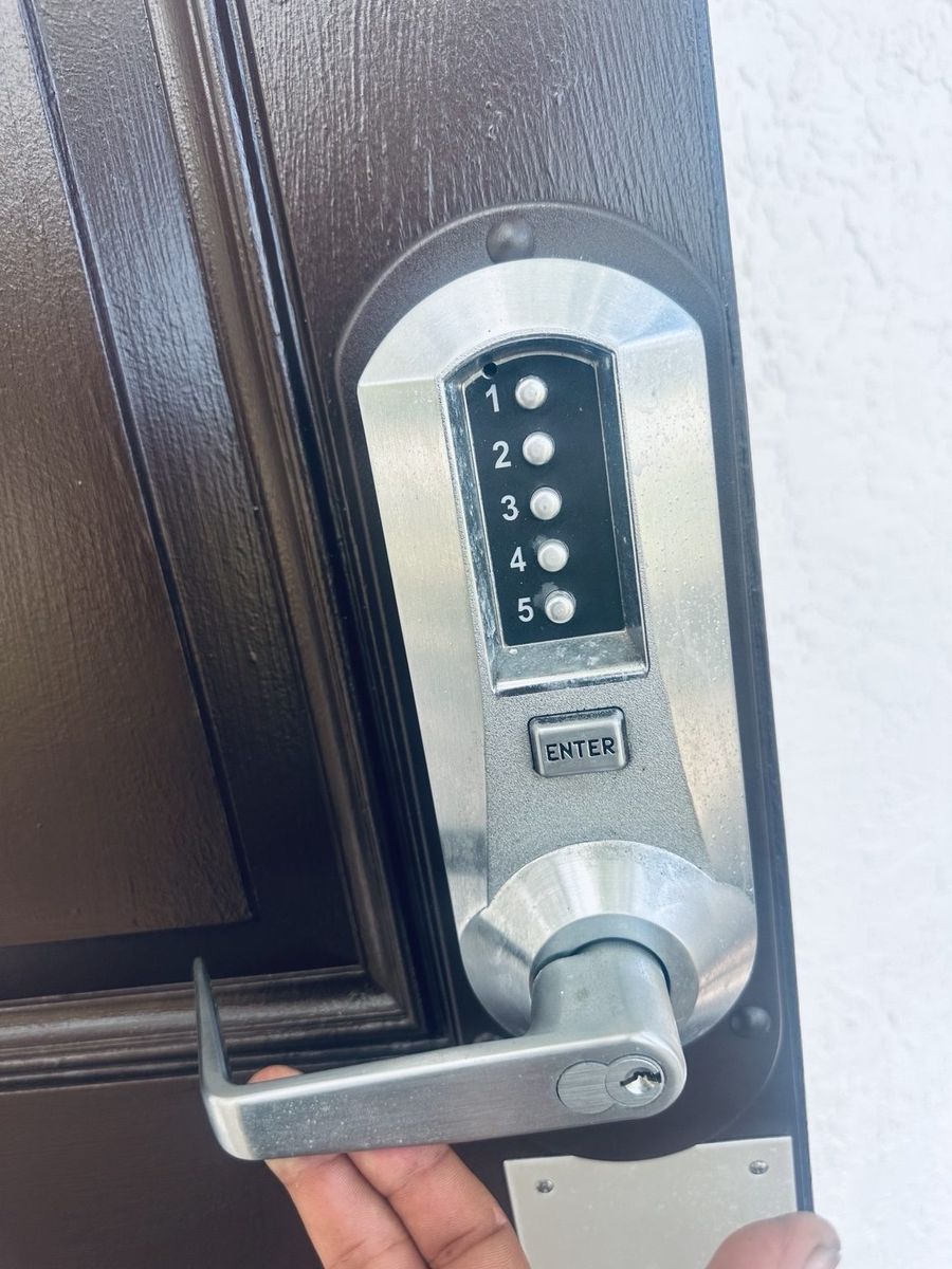 Mechanical push-button keypad lock installed on a Becker Road commercial door by St Lucie Lock and Key.